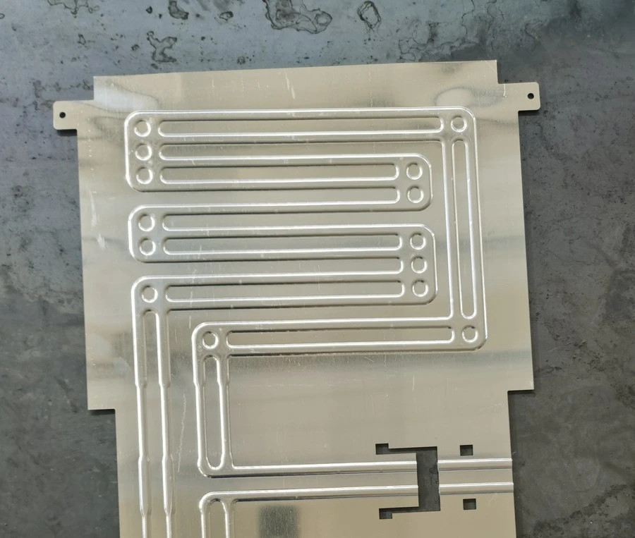 Roll-bond evaporator plate from the BD-198-10, serpentine channel visible